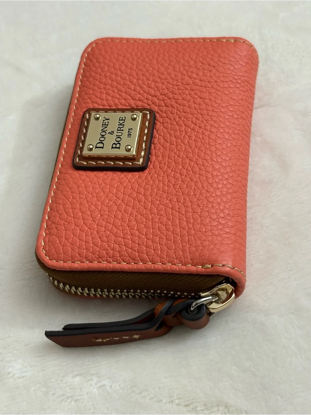 Dooney & Bourke Pebble Grain Large Zip Around Credit Card Case  Coral Color.